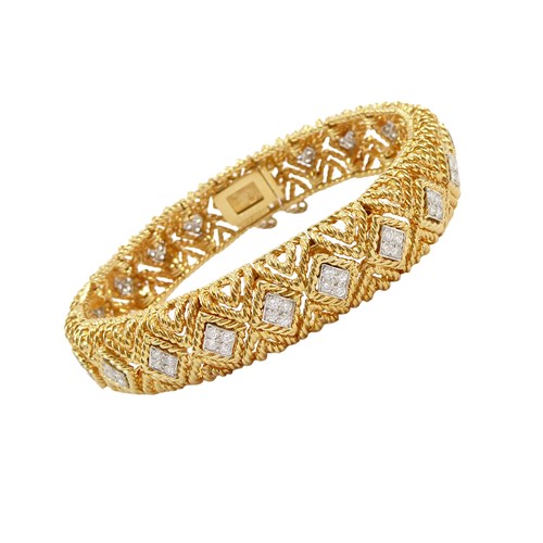 18ct gold and diamond openwork lozenge bracelet by Tiffany, American, slightly bombe form,